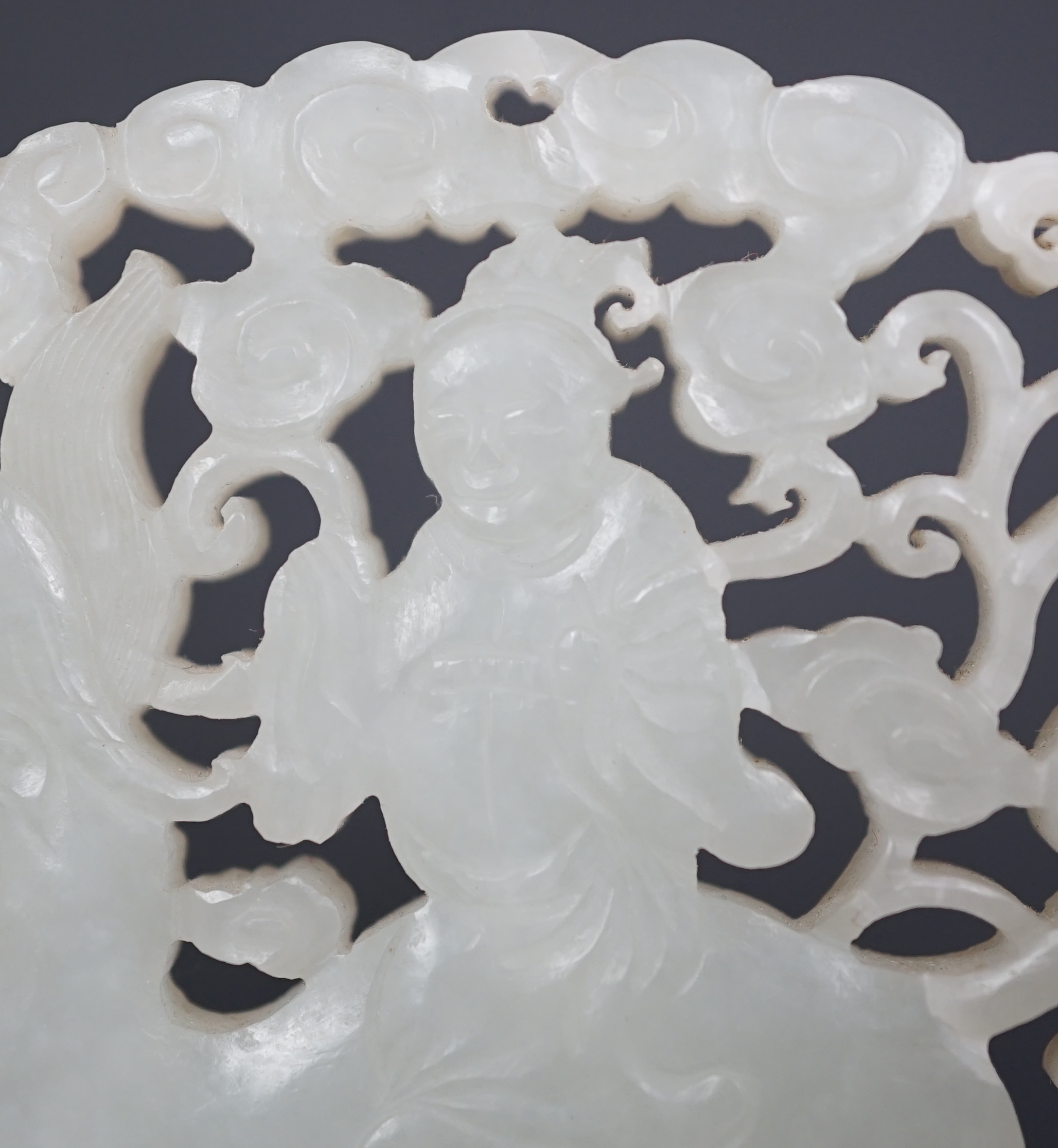 A Chinese white jade ‘qilin and rider’ plaque, 18th/19th century